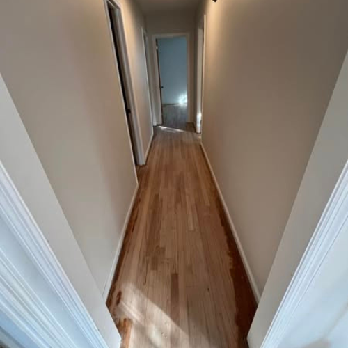 Sanded wood flooring.