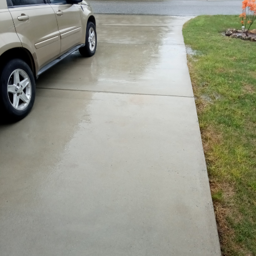 A close-up of a concrete sidewalk.