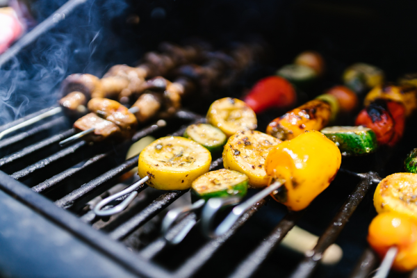 Vegetables on a skewer on a grill