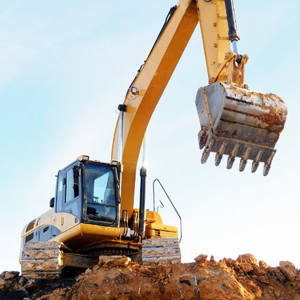 Earthmoving RentalsA loader on top of a pile of soil