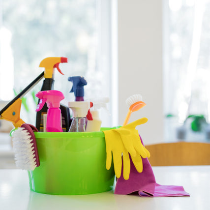 Home Goods/Cleaning & SuppliesHome cleaning supplies in a bucket on a counter.